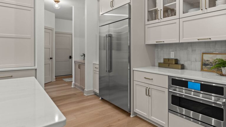 The Nora at Bella Vista Estates, modern kitchen with stainless steel appliances