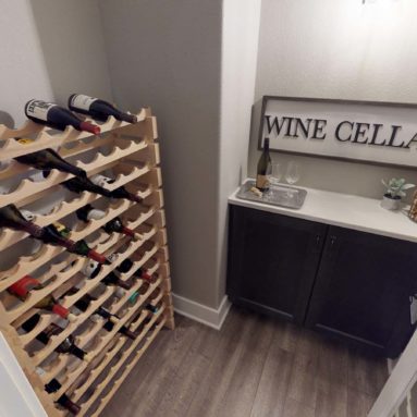 Demlang Builders - The Harper model home lower level wine cellar