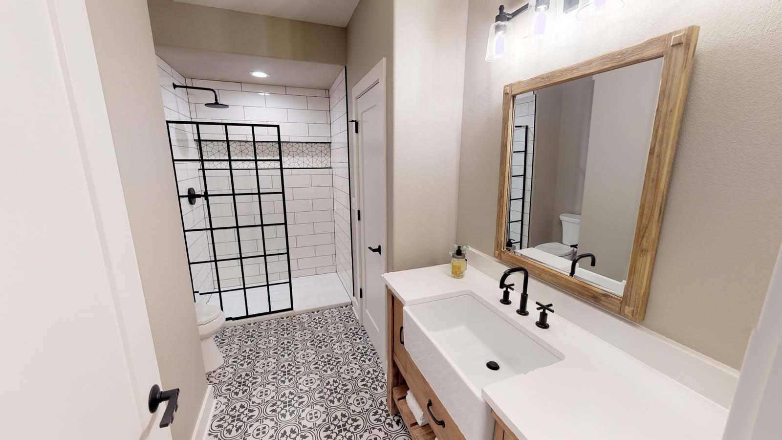 Demlang Builders - The Harper model home lower level bathroom