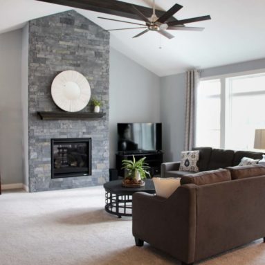 Living room with full-height fireplace in the Brooklyn model home