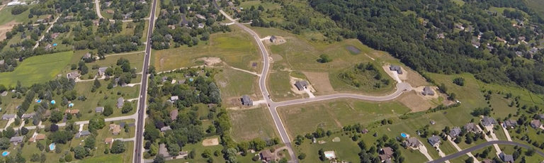 Choosing a subdivision lot can be a challenge. Here is an aerial view of a subdivision with lots for sale.