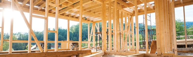 Interior frame of new wooden house under construction